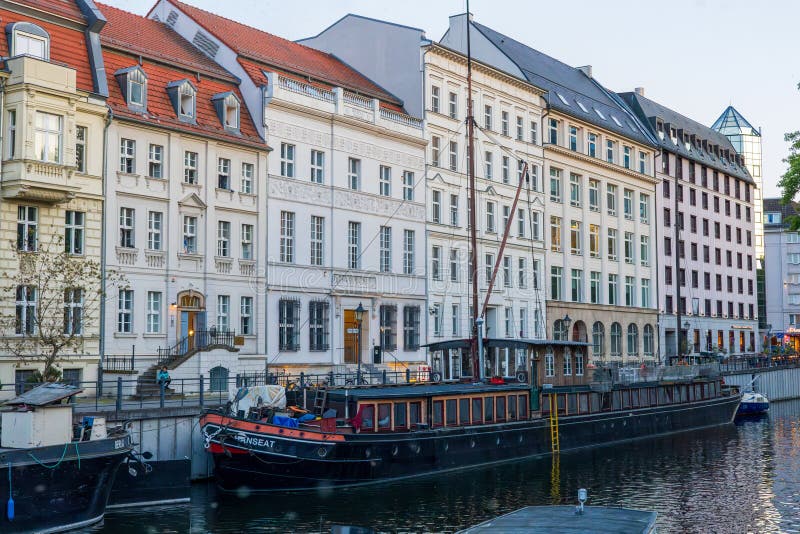 Berlin, Germany - June 2, 2023: Old discarded cargo ships on their mooring in the Historic port of Berlin, Germany. Berlin, Germany - June 2, 2023: Old discarded cargo ships on their mooring in the Historic port of Berlin, Germany.