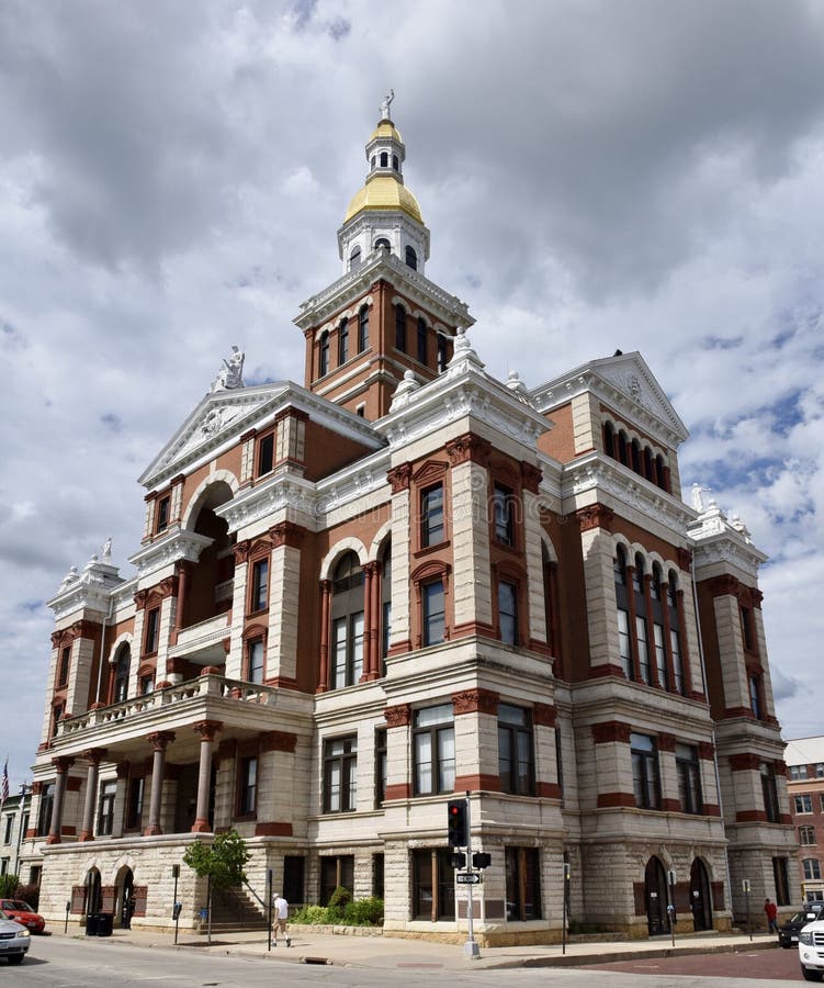 This is a Summer picture of the historic Dubuque County Courthouse under storm clouds, located in Dubuque, Iowa in Dubuque County. This Courthouse was designed by the architects of Heer, Fridolin & Son, the building is an example of Renaissance, Romanesque architecture, and it was built in 1891. The building was added to the National Register of Historic Places on June 23, 1971. This picture was taken on June 22, 2017. This is a Summer picture of the historic Dubuque County Courthouse under storm clouds, located in Dubuque, Iowa in Dubuque County. This Courthouse was designed by the architects of Heer, Fridolin & Son, the building is an example of Renaissance, Romanesque architecture, and it was built in 1891. The building was added to the National Register of Historic Places on June 23, 1971. This picture was taken on June 22, 2017.