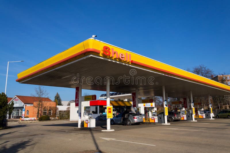 TABOR, CZECH REPUBLIC - FEBRUARY 6 2018: Royal Dutch Shell international oil and gas company logo on fuel station on February 6, 2018 in Tabor, Czech Republic. TABOR, CZECH REPUBLIC - FEBRUARY 6 2018: Royal Dutch Shell international oil and gas company logo on fuel station on February 6, 2018 in Tabor, Czech Republic.