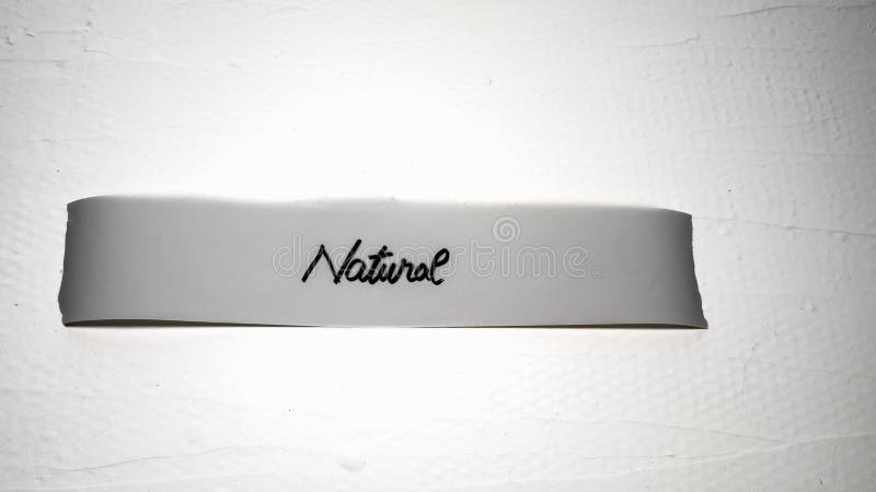 Writing natural on white label on white background. Writing natural on white label on white background