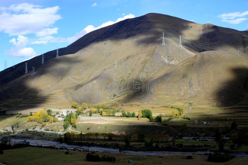 Electric power pylons are built on top of mountains in west Sichuan province, southwest of China. Electric power pylons are built on top of mountains in west Sichuan province, southwest of China.