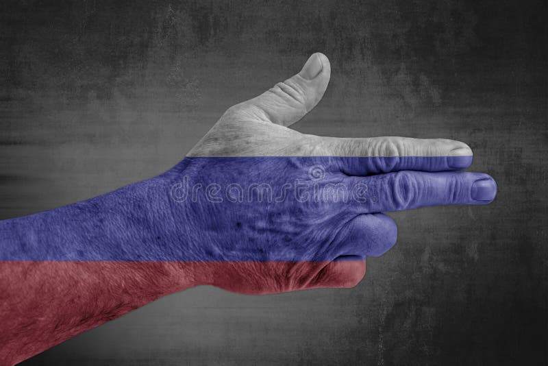 Russia flag painted on male hand like a gun. Russia flag painted on male hand like a gun