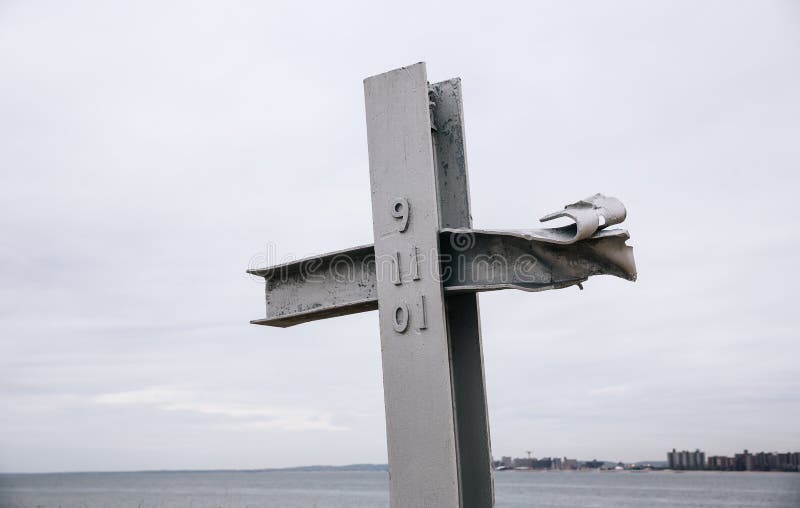 Breezy Point 9/11 Memorial, Queens, NY. Platform contains 29 glass etchings for each of the community members lost on 9/11 and a cross shaped piece of steel from WTC. Breezy Point 9/11 Memorial, Queens, NY. Platform contains 29 glass etchings for each of the community members lost on 9/11 and a cross shaped piece of steel from WTC.