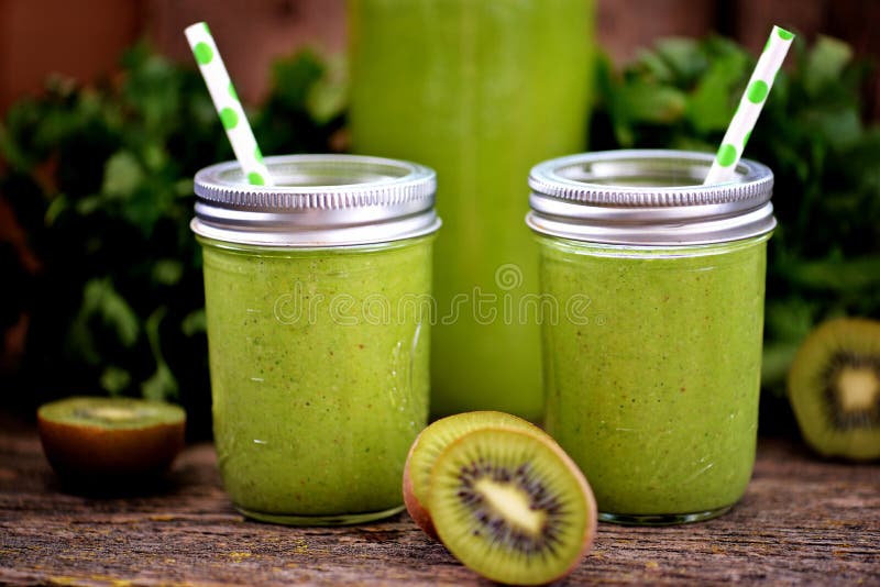 Healthy smoothies in mason jar from spinach, cucumber, celery, apple, parsley with olive oil. food. Healthy smoothies in mason jar from spinach, cucumber, celery, apple, parsley with olive oil. food