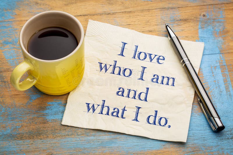 I love who I am and what I do - positive affirmation text on a napkin with a cup of coffee. I love who I am and what I do - positive affirmation text on a napkin with a cup of coffee