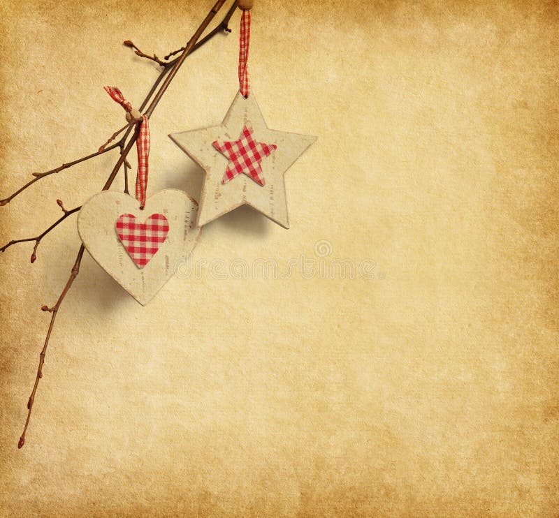 Christmas decoration hanging over old paper background. Christmas decoration hanging over old paper background.