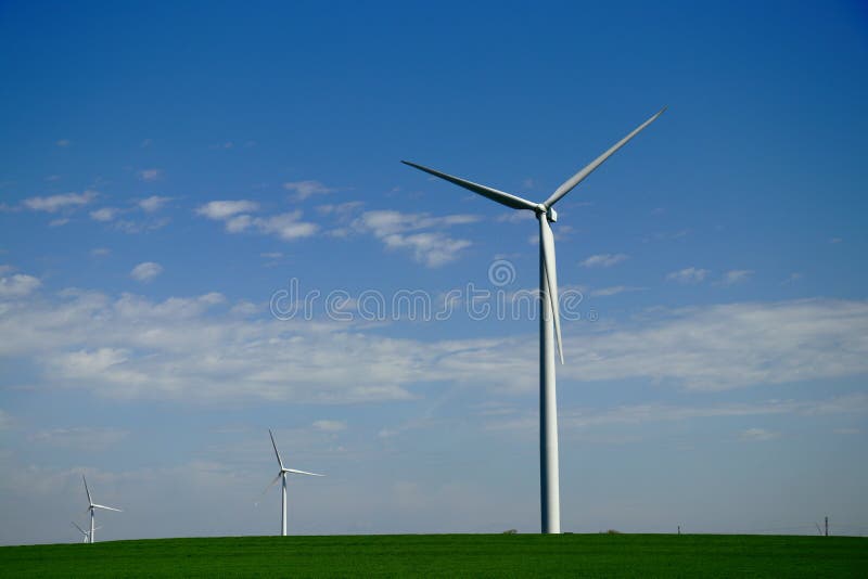 Windmill on Green Field in Rural Kansas, USA. Windmill on Green Field in Rural Kansas, USA.