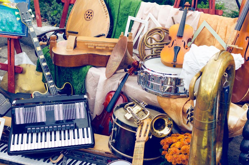 Pile of different old musical instruments. Pile of different old musical instruments.