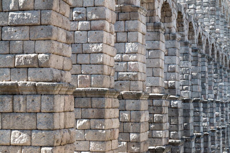 The aqueduct bridge in Spanish Segovia is a Roman aqueduct and one of the best-preserved elevated Roman aqueducts and the foremost symbol of Segovia, as evidenced by its presence on the city`s coat of arms. It was thought to have been built during the 1st century AD, during the reigns of the Emperors Domitian, Nerva, and Trajan. The aqueduct is built of unmortared, brick-like granite blocks and once transported water from the Rio Frio river, situated in mountains 17 km 11 mi from the city in the La Acebeda region. The aqueduct bridge in Spanish Segovia is a Roman aqueduct and one of the best-preserved elevated Roman aqueducts and the foremost symbol of Segovia, as evidenced by its presence on the city`s coat of arms. It was thought to have been built during the 1st century AD, during the reigns of the Emperors Domitian, Nerva, and Trajan. The aqueduct is built of unmortared, brick-like granite blocks and once transported water from the Rio Frio river, situated in mountains 17 km 11 mi from the city in the La Acebeda region.