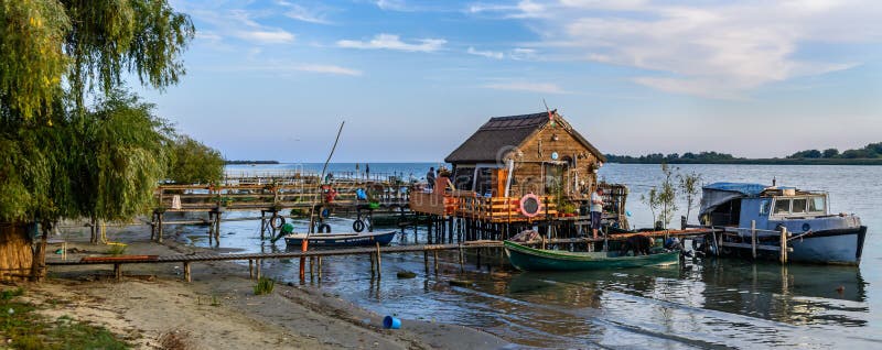 DOBROGEA, ROMANIA - OCTOBER 22, 2015: The Danube Delta spreads as much as 3446 kmÂ², being the second as range in Europe. It is located in the south-eastern side of Romania. DOBROGEA, ROMANIA - OCTOBER 22, 2015: The Danube Delta spreads as much as 3446 kmÂ², being the second as range in Europe. It is located in the south-eastern side of Romania.