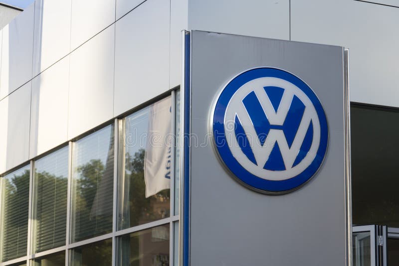 PRAGUE, CZECH REPUBLIC - SEPTEMBER 24: Volkswagen car maker logo on a building of dealership on September 24, 2015 in Prague, Czech republic. Great emission scandal raises around number of Volkswagen Group cars with the EA189, 2.0 litre TDI engine. PRAGUE, CZECH REPUBLIC - SEPTEMBER 24: Volkswagen car maker logo on a building of dealership on September 24, 2015 in Prague, Czech republic. Great emission scandal raises around number of Volkswagen Group cars with the EA189, 2.0 litre TDI engine.