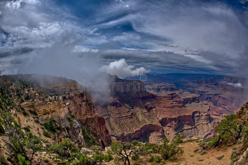 Coronado Butte at Grand Canyon South Rim Arizona in the clouds viewed from Moran Point. Coronado Butte at Grand Canyon South Rim Arizona in the clouds viewed from Moran Point