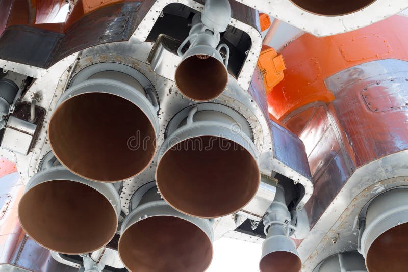 Large rocket nozzle close-up at day. Large rocket nozzle close-up at day.