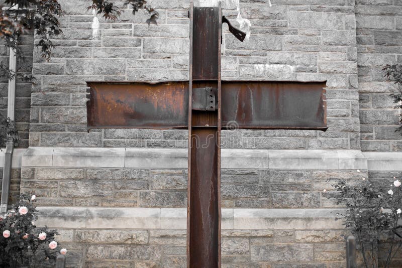 A cross of I-beams salvaged from the wreckage at Ground Zero is displayed outside the Church of the Good Shepherd on the far north end of Manhattan. The cross of World Trade Center beams stands in a small memorial garden with a buried time capsule containing mementos that belonged to victims of 9/11 from this neighborhood. A cross of I-beams salvaged from the wreckage at Ground Zero is displayed outside the Church of the Good Shepherd on the far north end of Manhattan. The cross of World Trade Center beams stands in a small memorial garden with a buried time capsule containing mementos that belonged to victims of 9/11 from this neighborhood.