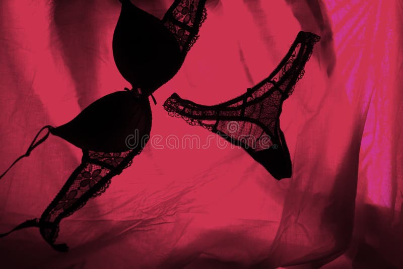 woman underwear in red light. sex concept. woman underwear in red light. sex concept