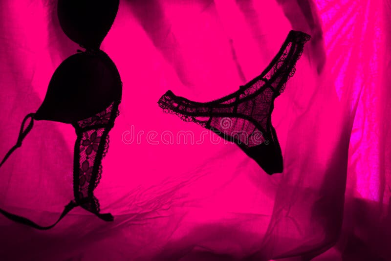 woman underwear in red light. sex concept. woman underwear in red light. sex concept