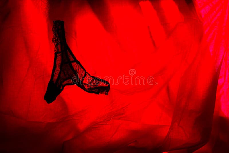 woman underwear in red light. sex concept. woman underwear in red light. sex concept