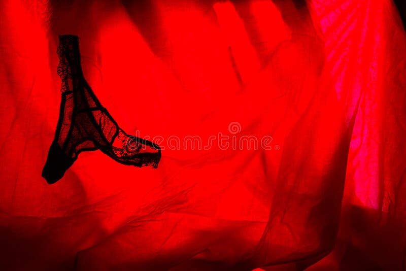 woman underwear in red light. sex concept. woman underwear in red light. sex concept