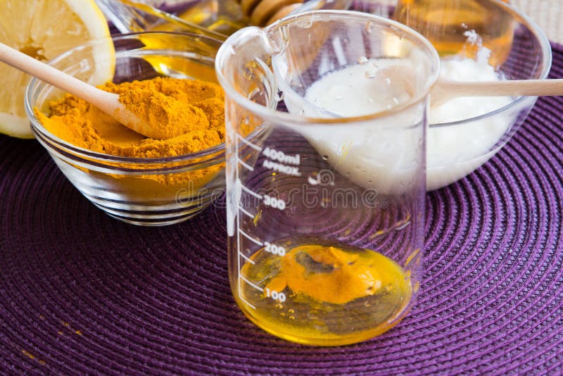 Preparation of the Turmeric face mask receipt set. Put ingredients in a beaker step. Ingredients: 1/2 teaspoon turmeric powder -Â½ teaspoon organic apple cider vinegar -one tablespoon of organic, raw, bee honey -Â½ teaspoon milk or yogurtn-one drop lemon essential oil or fresh lemon juice for skin brightening effect. Preparation of the Turmeric face mask receipt set. Put ingredients in a beaker step. Ingredients: 1/2 teaspoon turmeric powder -Â½ teaspoon organic apple cider vinegar -one tablespoon of organic, raw, bee honey -Â½ teaspoon milk or yogurtn-one drop lemon essential oil or fresh lemon juice for skin brightening effect