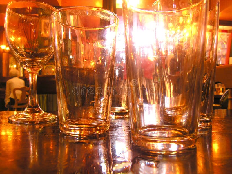 Empty glasses in a pub. Empty glasses in a pub