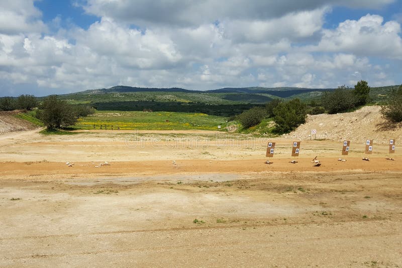 Outdoor shooting range, IDF army soldiers training zone, targets, nature background, Middle East, Israel. Outdoor shooting range, IDF army soldiers training zone, targets, nature background, Middle East, Israel