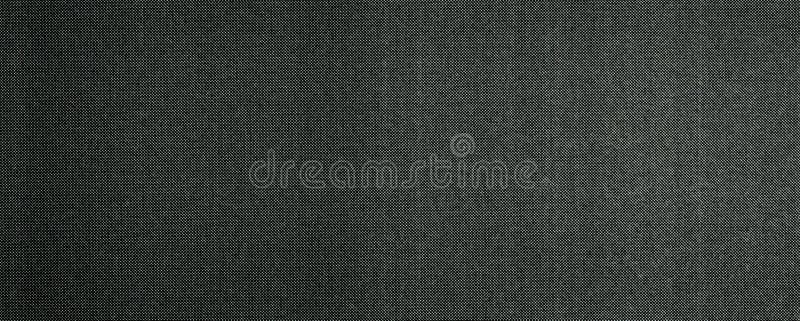 wide grunge dark grey dotted halftone pattern printed on paper useful as a background. wide grunge dark grey dotted halftone pattern printed on paper useful as a background