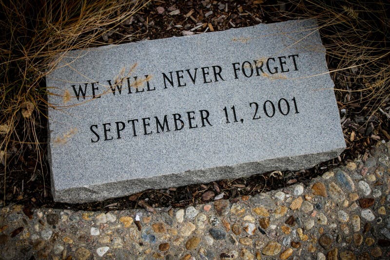 'We will never forget' stone memorial to victims of September 11, 2001 attack in New York. 'We will never forget' stone memorial to victims of September 11, 2001 attack in New York.