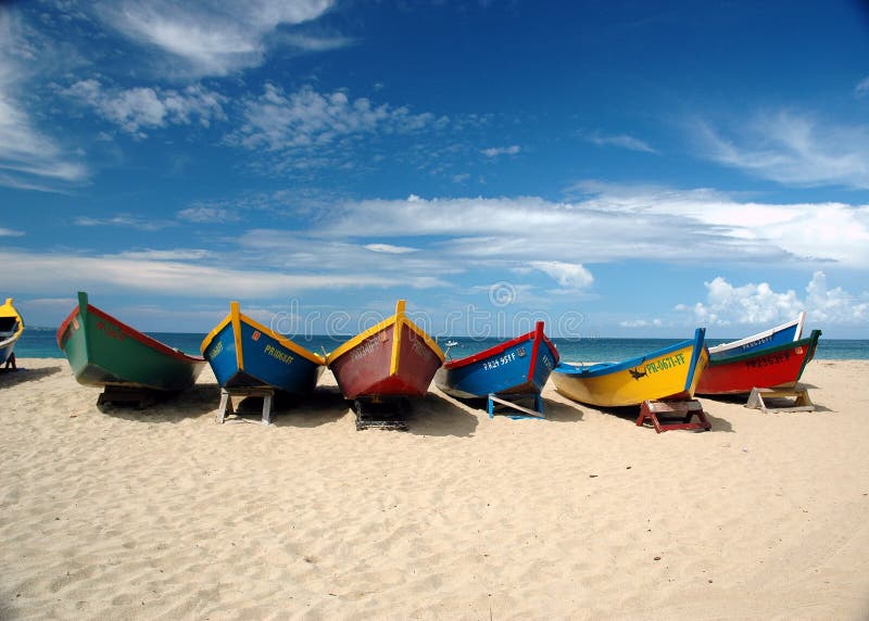 Colorful boats i found walking down the beach. Colorful boats i found walking down the beach.