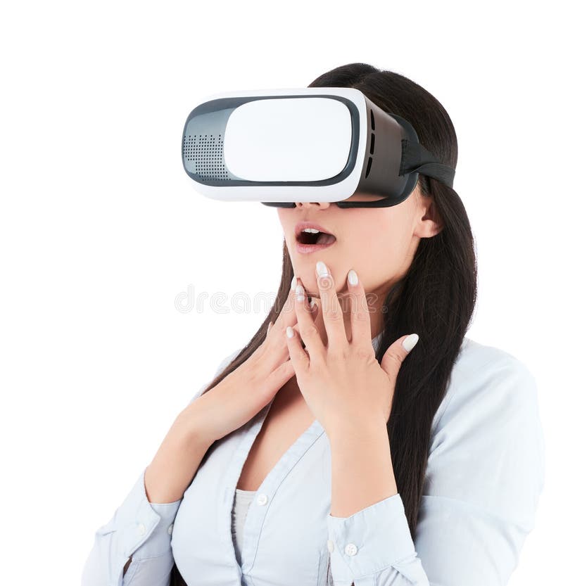 少妇使用在白色背景的VR耳机 图库摄影