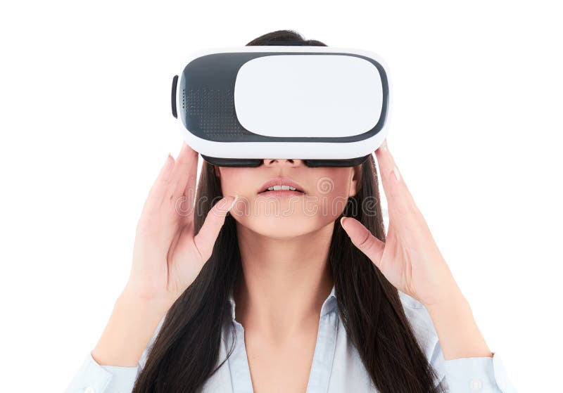 少妇使用在白色背景的VR耳机 免版税库存照片