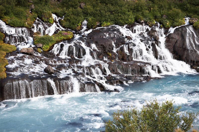 Landscape of Iceland. The mountain river with rapids. Landscape of Iceland. The mountain river with rapids.