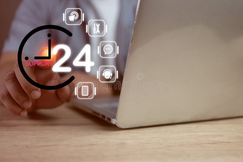 工程师或技术人员指着服务图标，24小时7天待命，以支持 库存照片