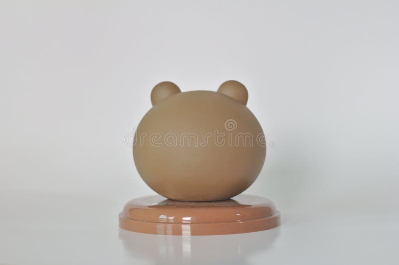 Brown Teddy Bear Head Coffee Mug Lid White Background Collectibles Toys Coffee Drinkers Cute Dolls Drinks in front of the cinema. Brown Teddy Bear Head Coffee Mug Lid White Background Collectibles Toys Coffee Drinkers Cute Dolls Drinks in front of the cinema