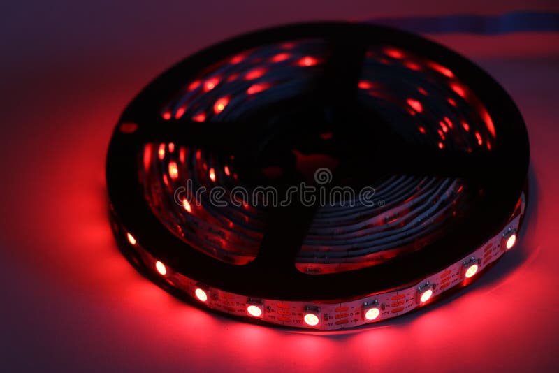 Red color light emitting diode in a strip. smart led strip reels. Red color light emitting diode in a strip. smart led strip reels