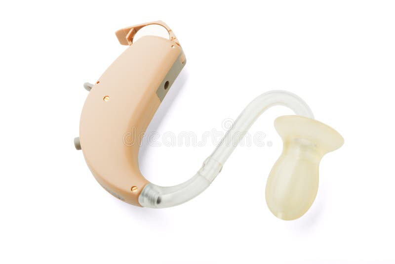 The hearing aid isolated on a white background. The hearing aid isolated on a white background