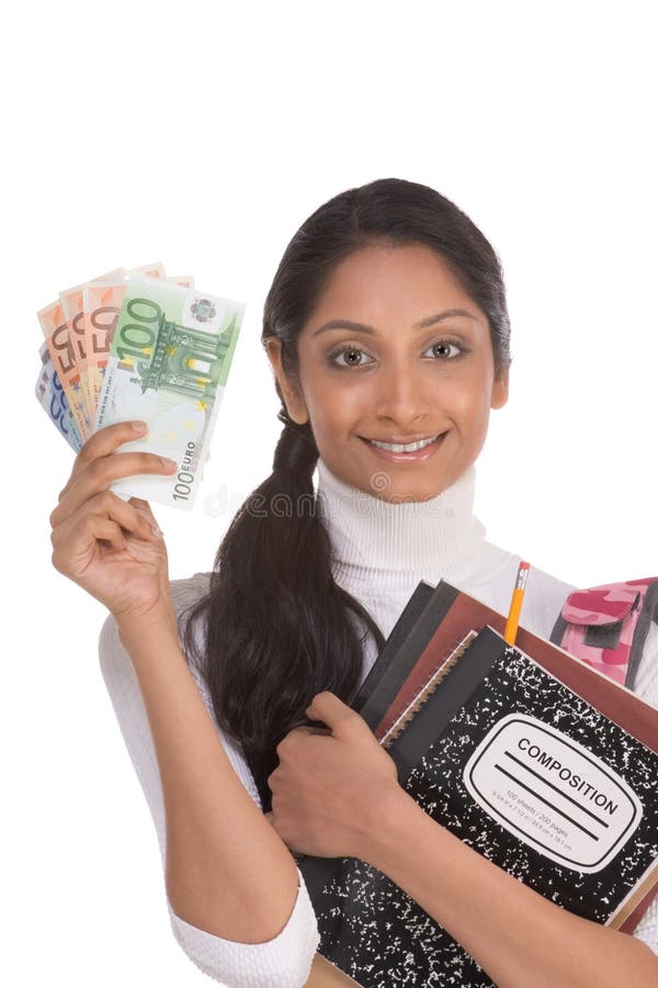 Ethnic Indian college student with compositions notebook, copybooks and backpack holds pile 100 (one hundred), 50 (fifty) and 20 (twenty) euro bills happy getting money help to subsidies costly university cost. Ethnic Indian college student with compositions notebook, copybooks and backpack holds pile 100 (one hundred), 50 (fifty) and 20 (twenty) euro bills happy getting money help to subsidies costly university cost