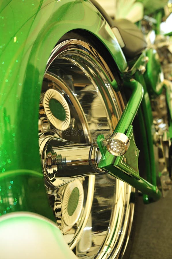 Ultra clean bike, detail of the reflections at the chromed wheel. Ultra clean bike, detail of the reflections at the chromed wheel