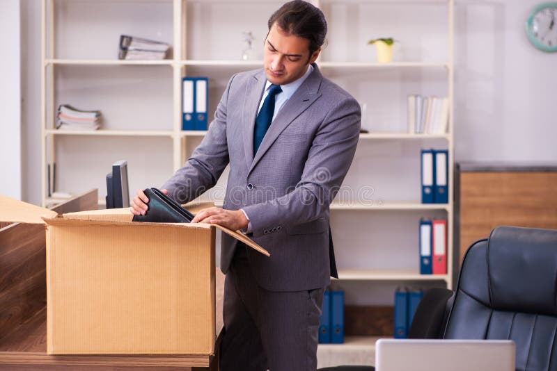 Young employee being dismissed from his work. Young employee being dismissed from his work