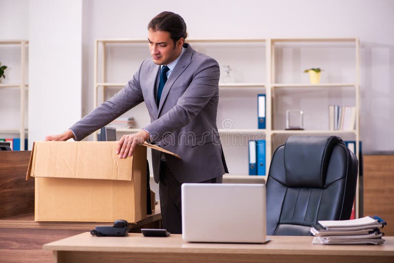 Young employee being dismissed from his work. Young employee being dismissed from his work