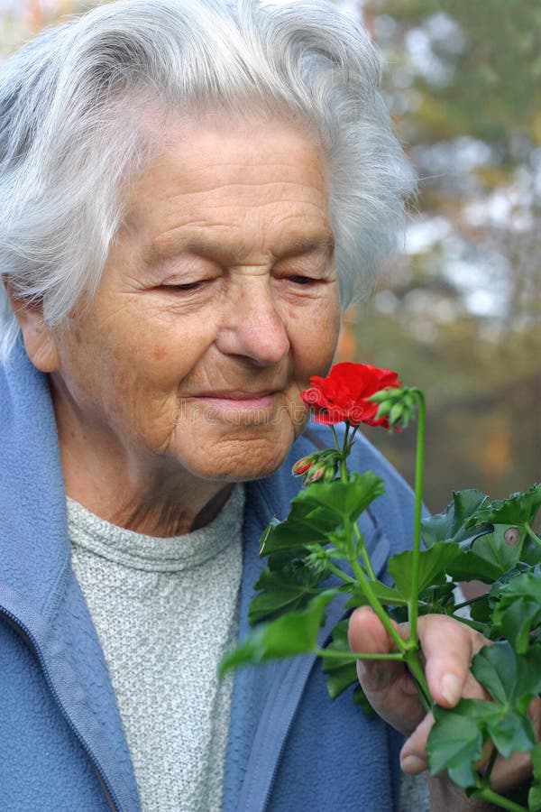 Elderly woman (89 years old) in the garden. Elderly woman (89 years old) in the garden.