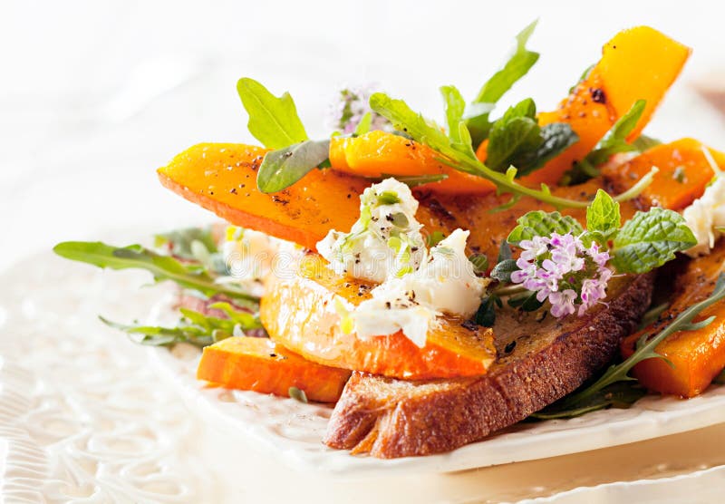 Appetizing Gourmet Hokkaido Rocket Salad Served on Table. Ready to Eat Delicious Food. Appetizing Gourmet Hokkaido Rocket Salad Served on Table. Ready to Eat Delicious Food.