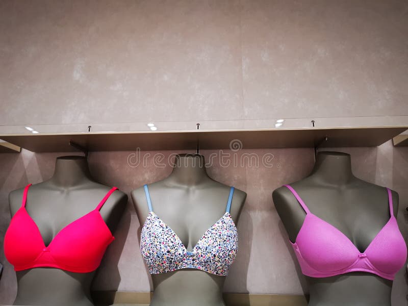 Underwear women - variety of colorful bras in a store. Underwear women - variety of colorful bras in a store.