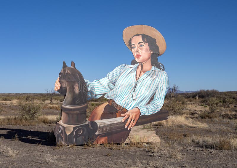 Pictured is a mural of Elizabeth Taylor, one of a group of murals painted by California based muralist John Cerney depicting scenes from the American Western movie `Giant` on Highway 90 five miles West of Marfa, Texas.  They are located on Wyatt Ranch, were some of the movie was filmed. 
 Elizabeth Taylor, James Dean, and Rock Hudson were the movies stars.  Cerney murals can be described as `giant cut-out art`. Pictured is a mural of Elizabeth Taylor, one of a group of murals painted by California based muralist John Cerney depicting scenes from the American Western movie `Giant` on Highway 90 five miles West of Marfa, Texas.  They are located on Wyatt Ranch, were some of the movie was filmed. 
 Elizabeth Taylor, James Dean, and Rock Hudson were the movies stars.  Cerney murals can be described as `giant cut-out art`.