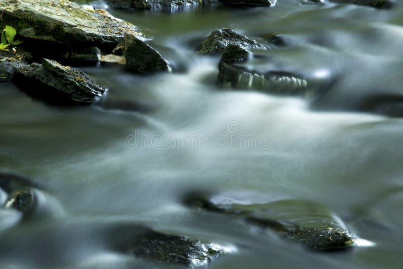 Long exposure creates light streaks in the rapids of the Blackledge River in Gay City State Park, Hebron, Connecticut. Long exposure creates light streaks in the rapids of the Blackledge River in Gay City State Park, Hebron, Connecticut.