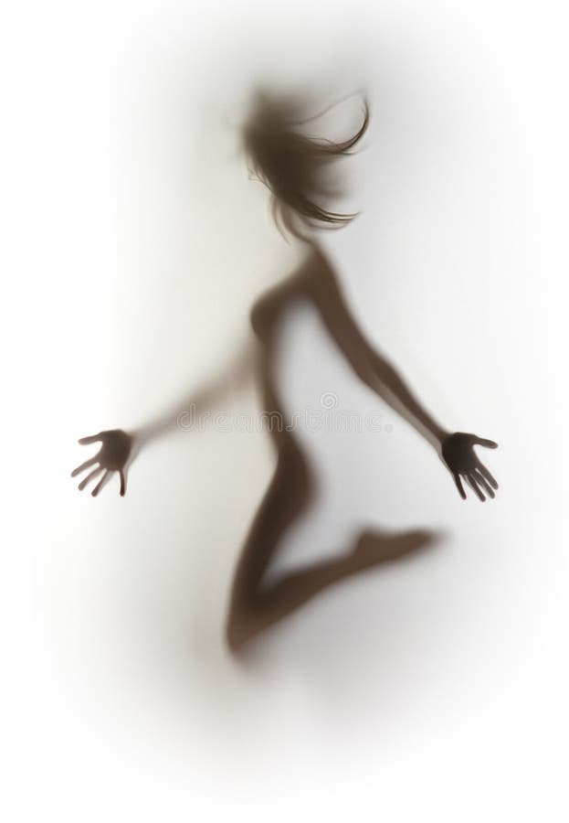 Naked human female body silhouette behind a glass surface. Naked human female body silhouette behind a glass surface