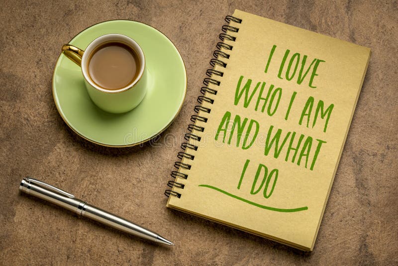 I love who I am and what I do - positive affirmation words in a spiral notebook with a cup of coffee, self esteem and personal development concept. I love who I am and what I do - positive affirmation words in a spiral notebook with a cup of coffee, self esteem and personal development concept