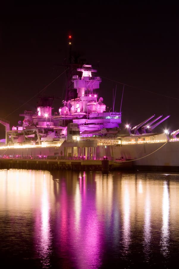 A night View of a battleship in Camden, New Jersey waterfront on the Delaware River across from Philadelphia, Pennsylvania The superstructure of the ship is lit with pink lights for the 7th annual Lights for the Cure to launch National Breast Cancer Awareness Month (October) . The Pink lights represent: awareness, hope, and getting closer to a world without breast cancer every day. A night View of a battleship in Camden, New Jersey waterfront on the Delaware River across from Philadelphia, Pennsylvania The superstructure of the ship is lit with pink lights for the 7th annual Lights for the Cure to launch National Breast Cancer Awareness Month (October) . The Pink lights represent: awareness, hope, and getting closer to a world without breast cancer every day.