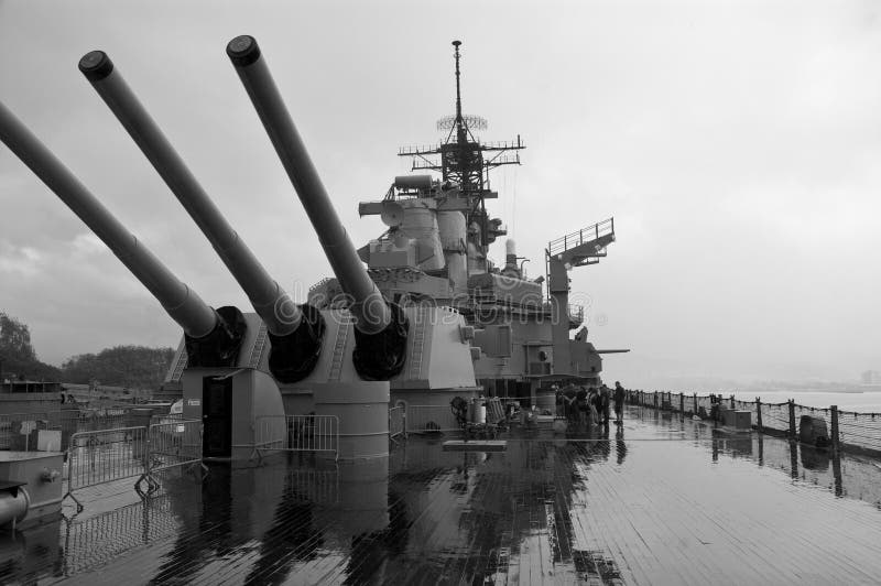 Gun turrets on the historic Battleship Missouri on a rainy day. Gun turrets on the historic Battleship Missouri on a rainy day.