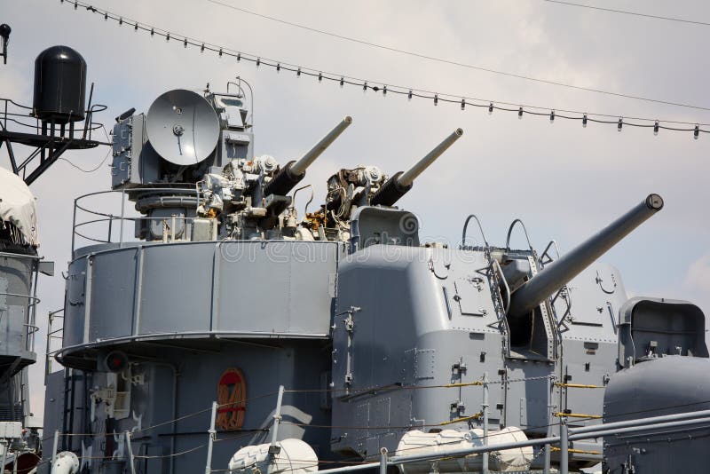 View of main guns on an old battleship. Fletcher-class destroyer. View of main guns on an old battleship. Fletcher-class destroyer.