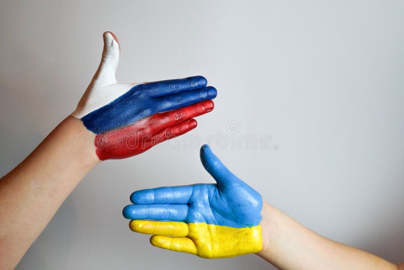 Hand painted in the colors of the flag of Russia and Ukraine. War in Ukraine. Hand painted in the colors of the flag of Russia and Ukraine. War in Ukraine.